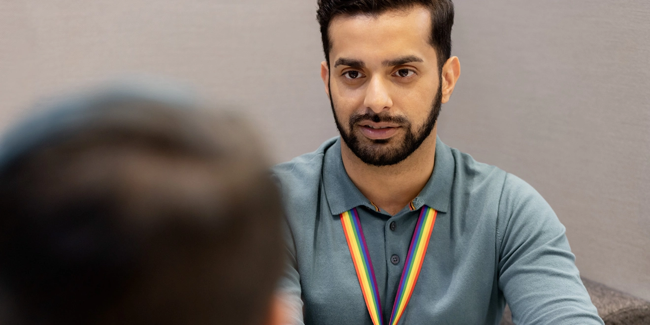 Man in conversation